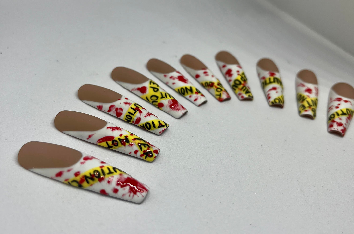 Bloody caution press on nails