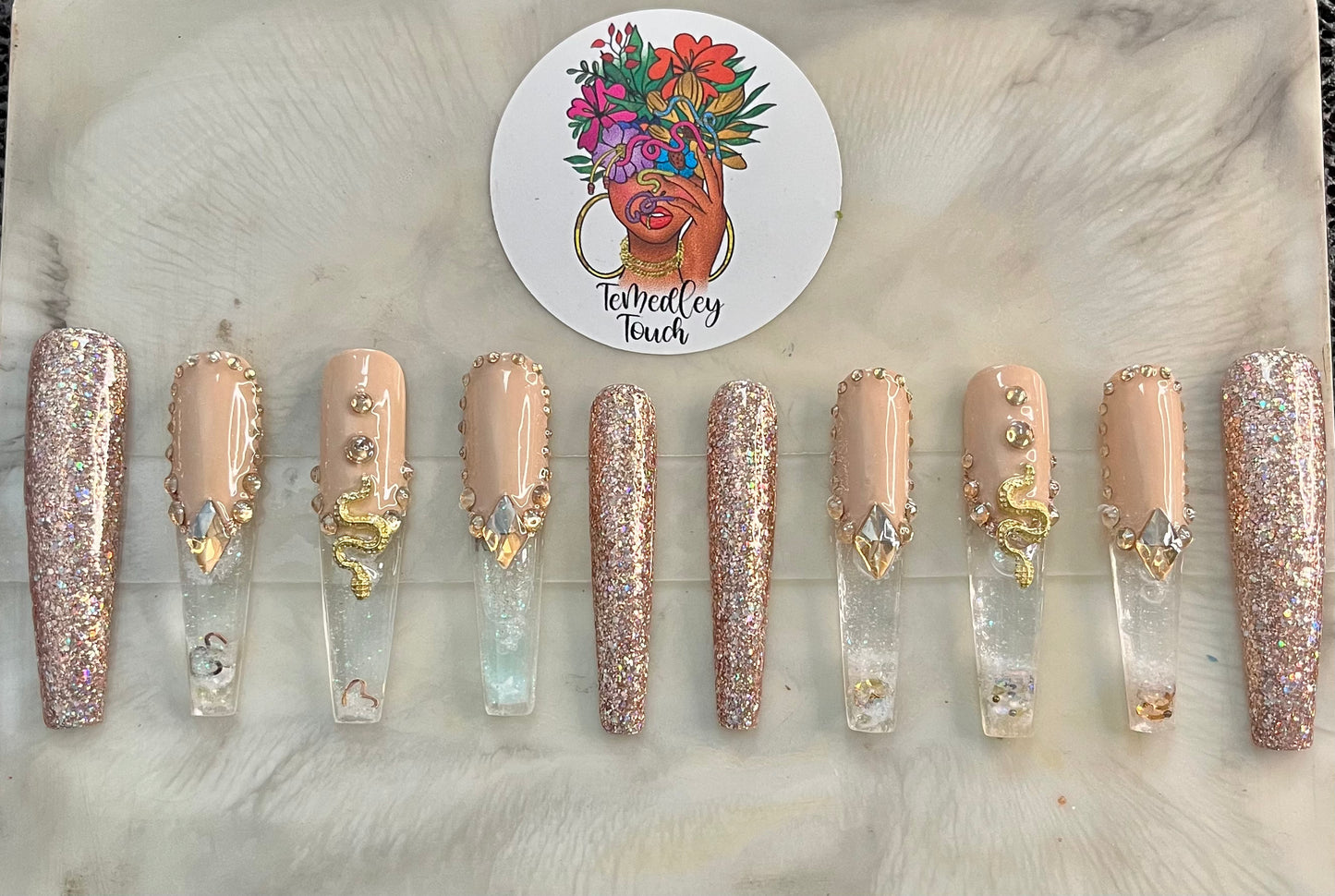 Gold snowglobe press on nails